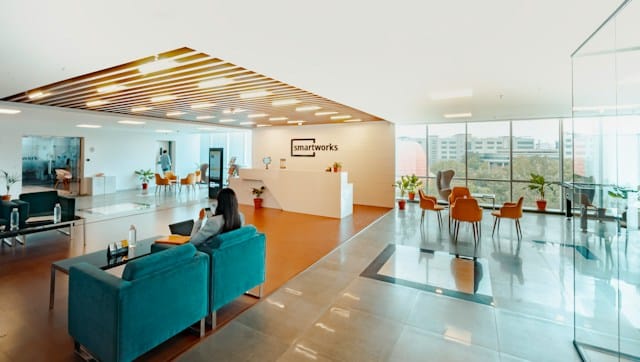 Reception area organized by an interior fit out specialist, the area has sofas chairs and the clients are comfortably seated and enjoying their time